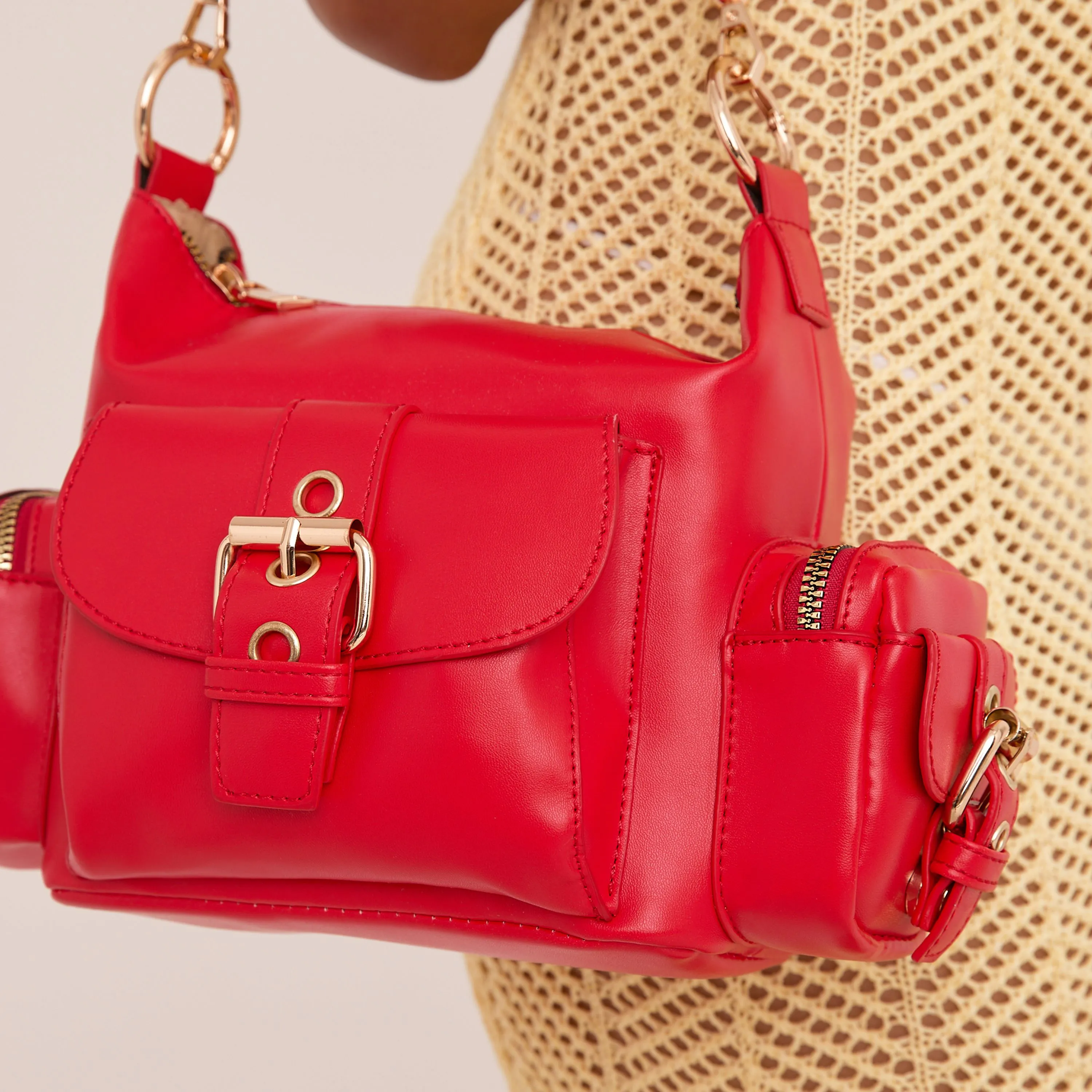 Valencia Multi Pocket Buckle Detail Shoulder Bag In Red Faux Leather